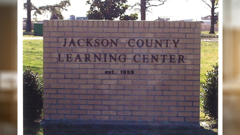 Jackson county learning center text on a brick sign 